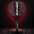 Babolat Nocta racket in a dark red studio