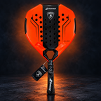 Orange Lamborghini-style padel racket on dark studio background